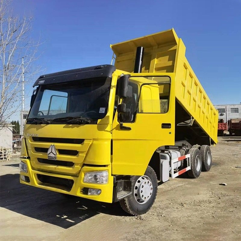 ABS Yes Fully Refurbished Sinotruck Howo 371hp 8x4 24 Cubic Meter Tipper Dump Truck Tire 12.00R20