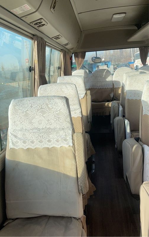 30 Seats LHD Driving Bus with 4104ml Displacement and Diesel Fuel to Meet Your Needs