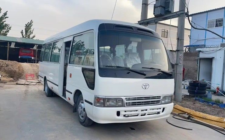 Affordable Left Hand Drive Toyota Coaster Bus with 9.00R20 Tires and 113/5200 Max Power