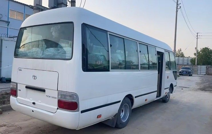 Affordable Left Hand Drive Toyota Coaster Bus with 9.00R20 Tires and 113/5200 Max Power