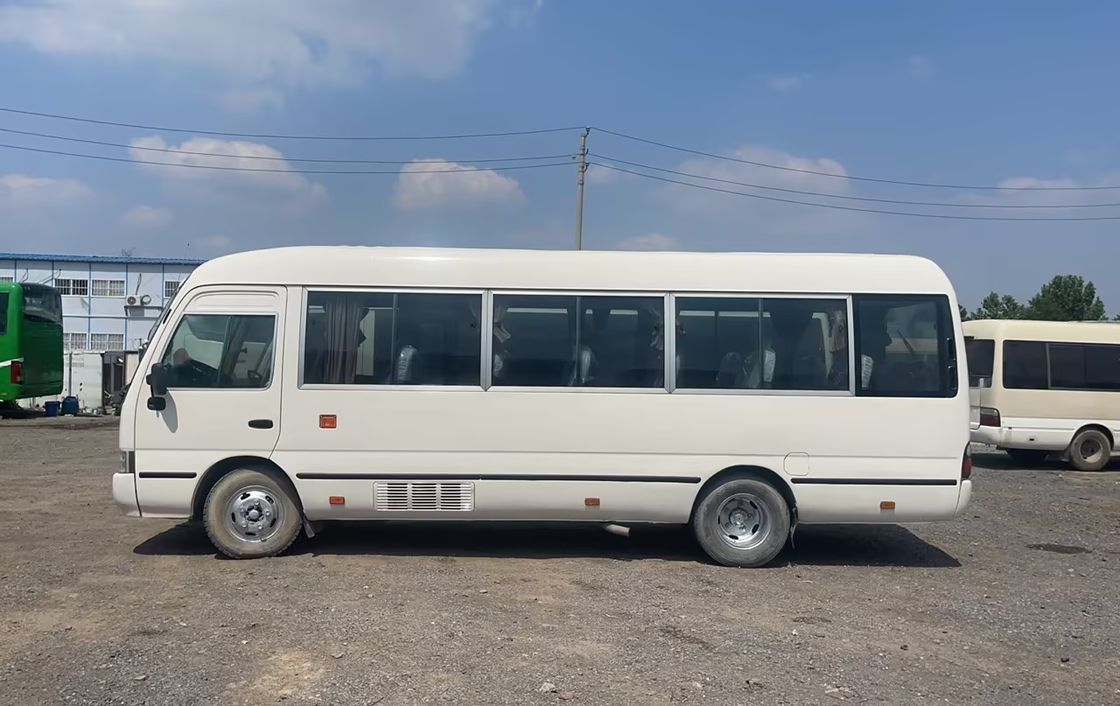 7m 30 Seater Toyo Ta Coaster Bus Engine Capacity 4L Overall Dimensions mm 7725x2000x2600