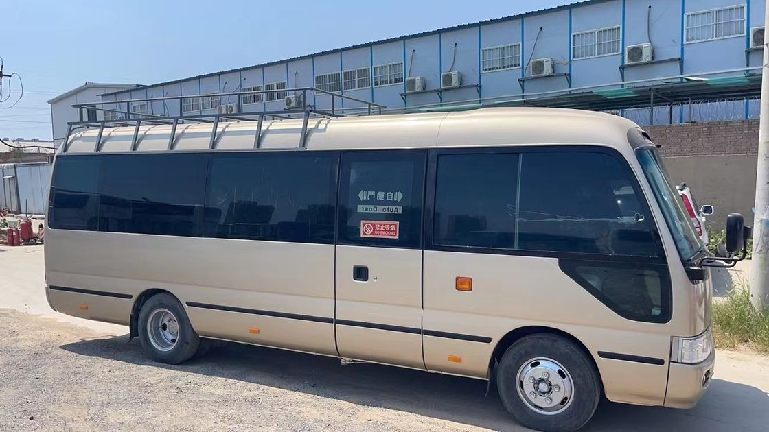 Used Toyota Coaster Bus in Japan 30 Seater with 1HZ Engine and 9.00R20 Tires