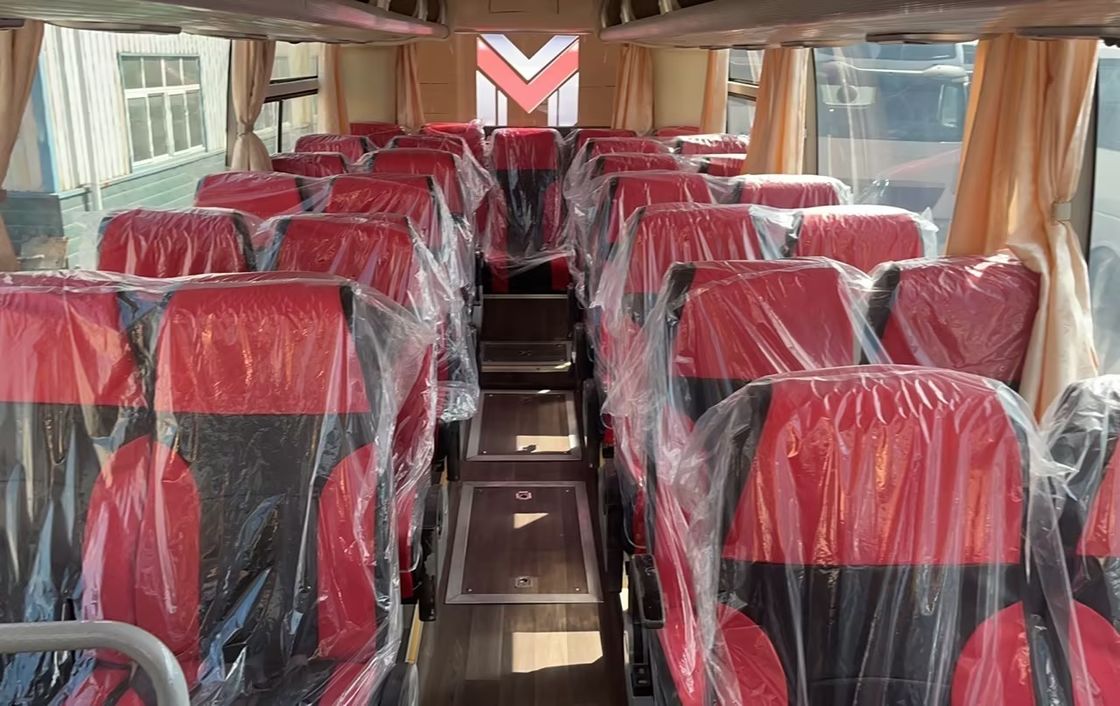 Find your perfect 47-seater coach bus with rear engine and low mileage of 56000km at our