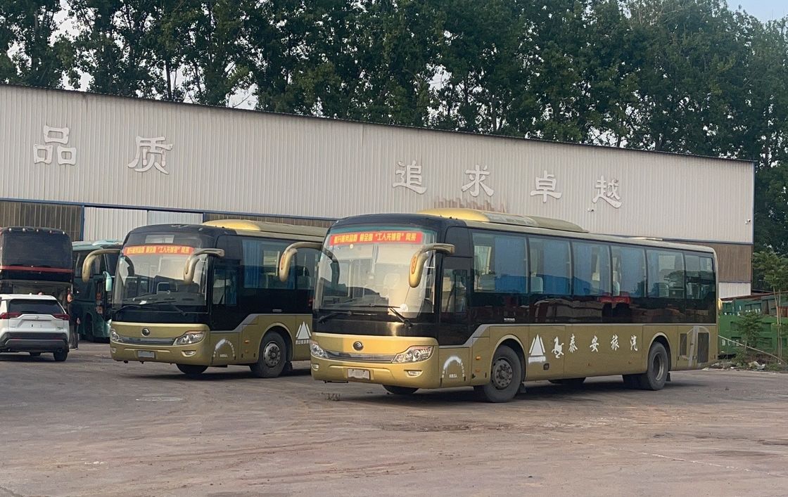 Stock of 65 Seats LHD Tour Bus with Euro 3 Emission Standard and Leaf Spring Suspension