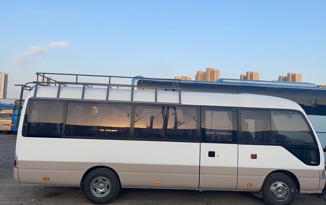 1690/1490mm Front/Rear Track High Roof Coaster Bus with 23 6 Seats and Diesel Engine
