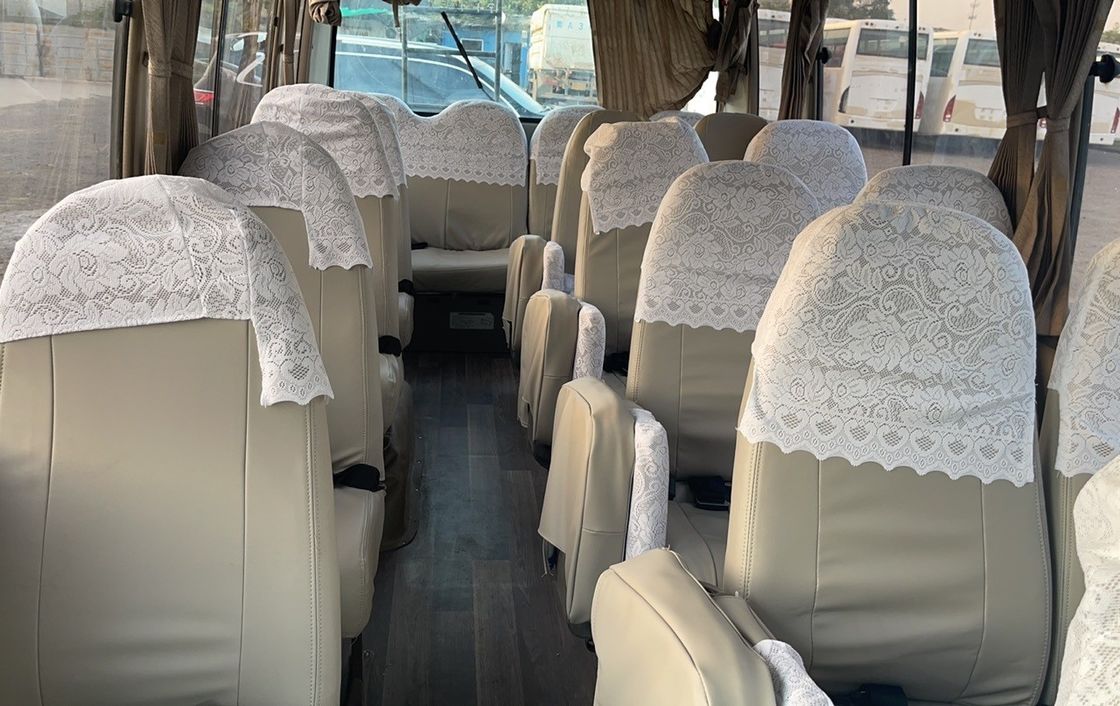 1690/1490mm Front/Rear Track High Roof Coaster Bus with 23 6 Seats and Diesel Engine